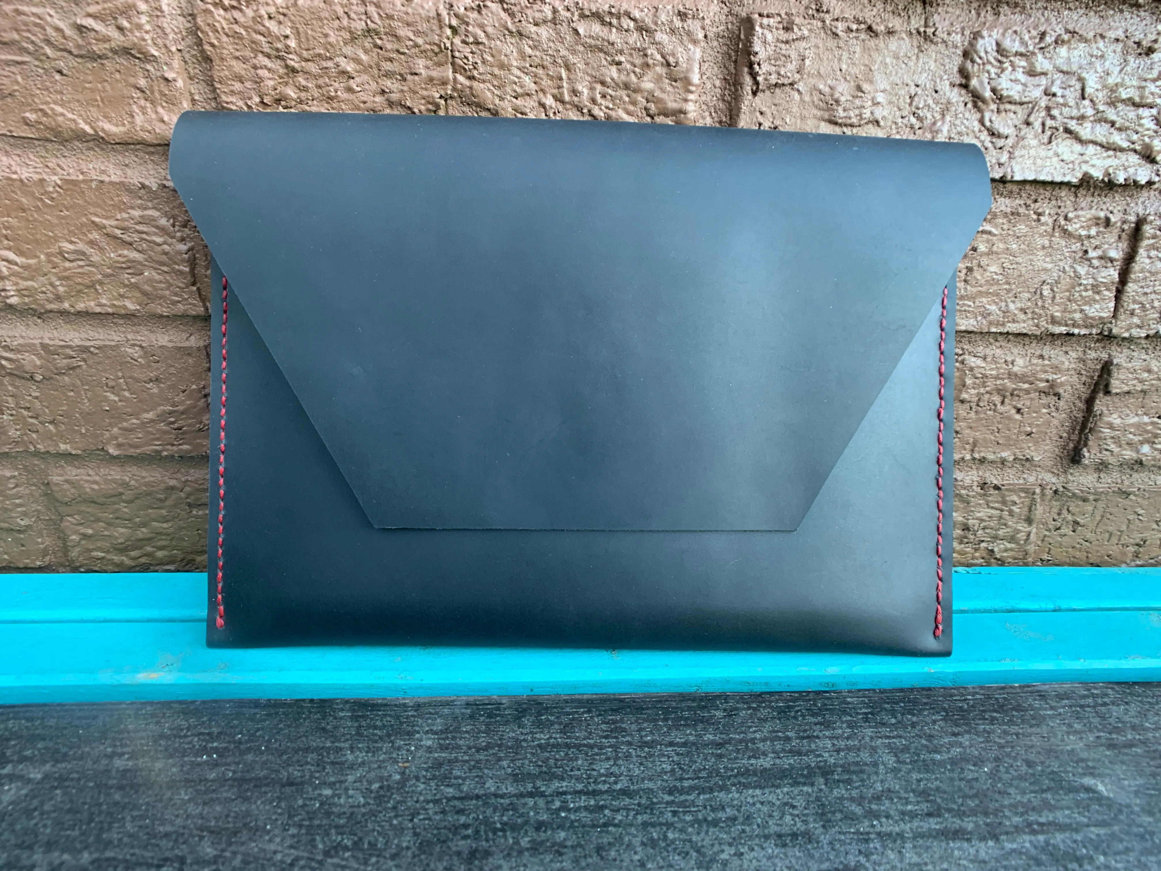 “The Carl” in Midnight Black Oil Tanned Leather with Red Stitching