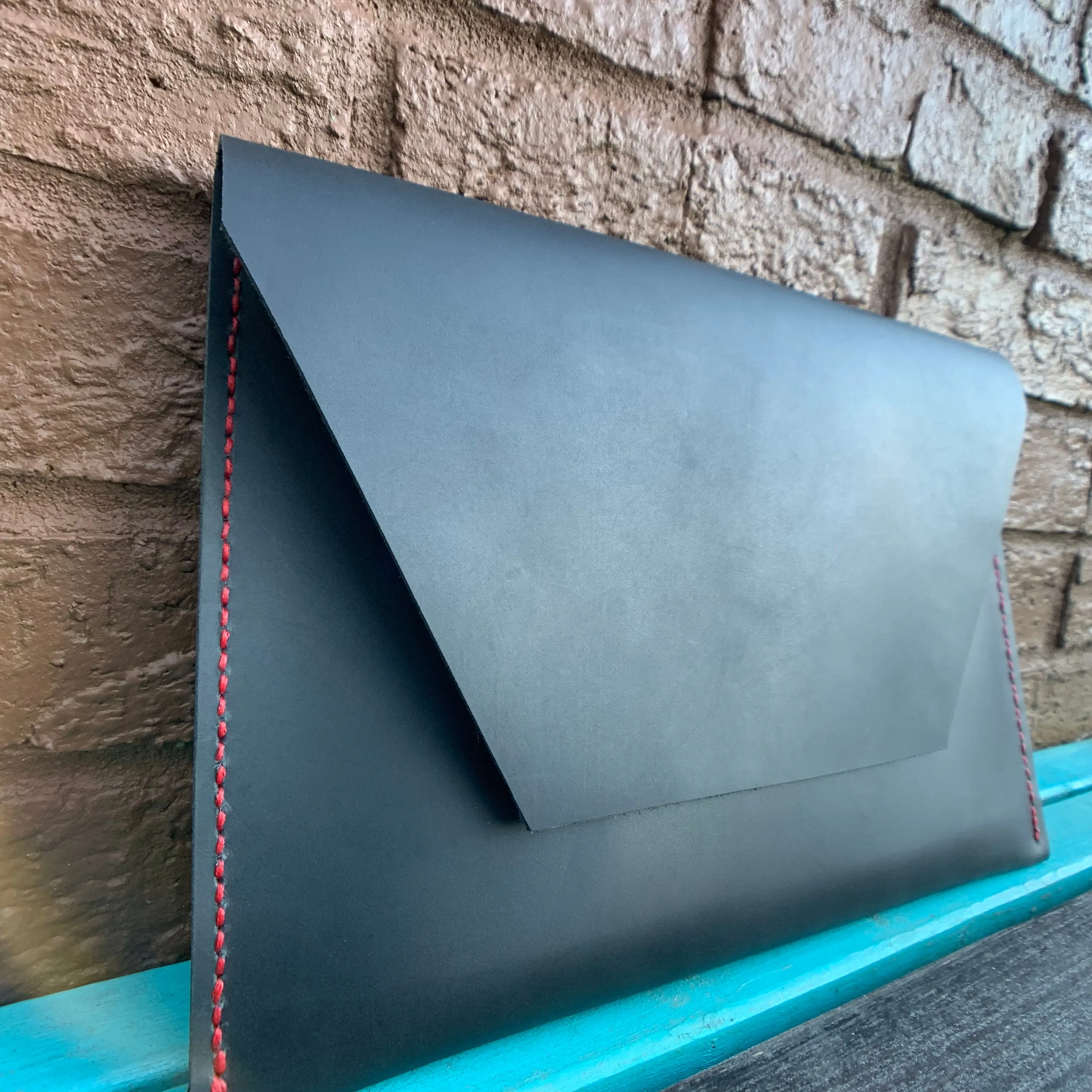 “The Carl” in Midnight Black Oil Tanned Leather with Red Stitching